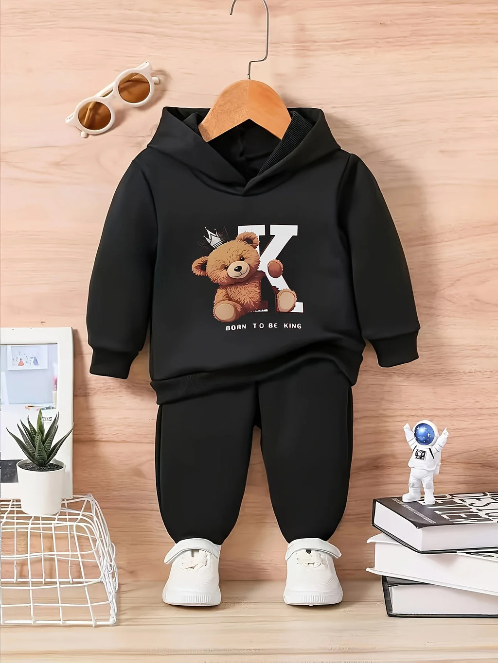 A two-piece cartoon printed fleece hoodie and long pants set for a newborn baby boy in autumn and winter